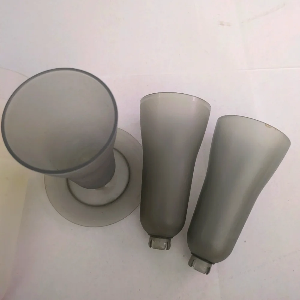 Vintage Tupperware dessert cups. 3 gray, 4 white, only one gray base included.